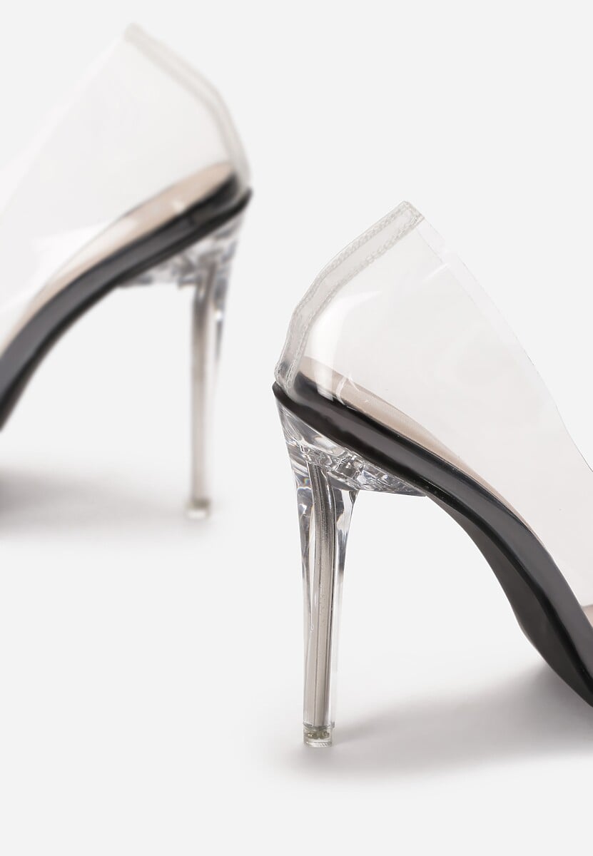 Transparent stiletto pumps with a black sole