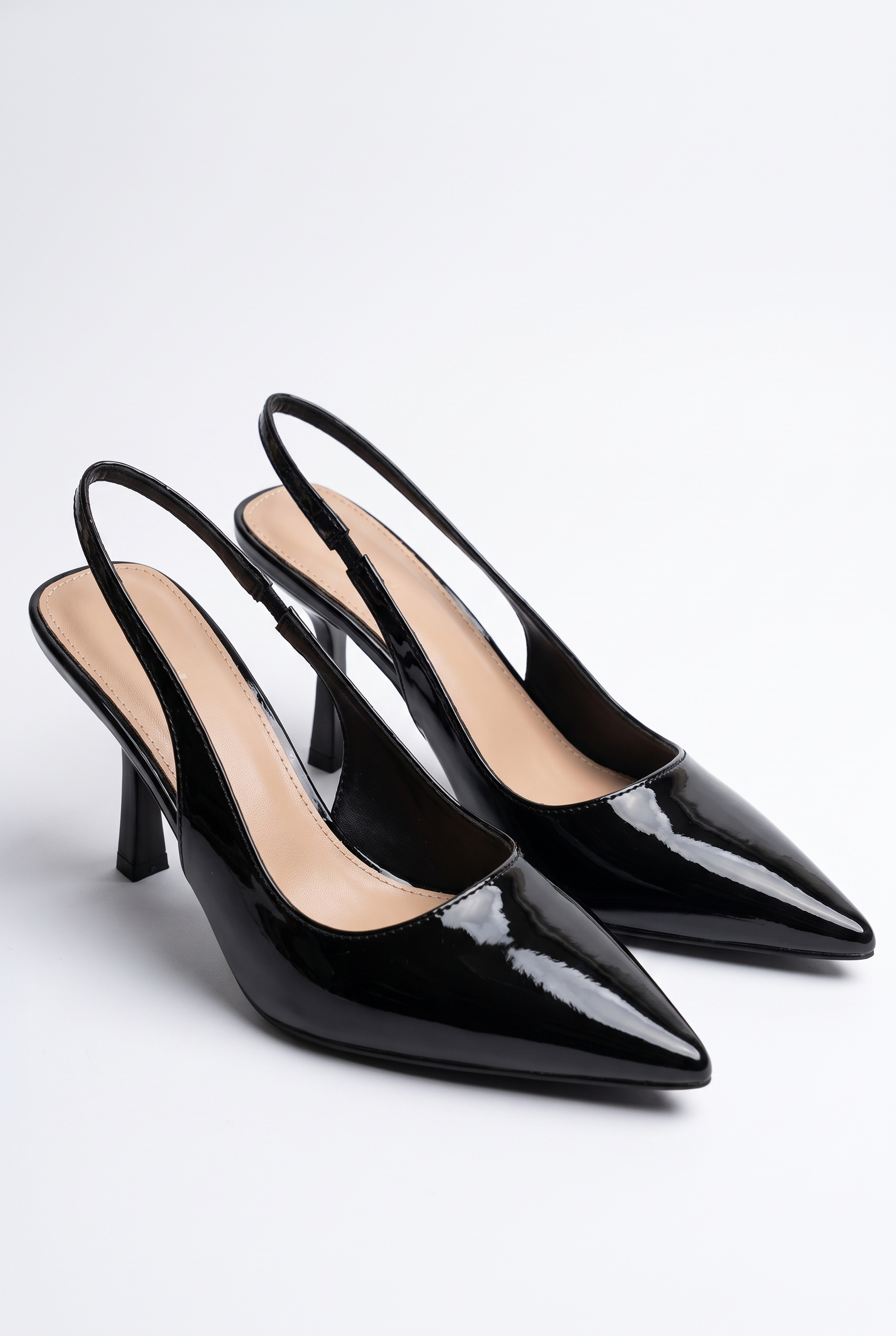 Black suede stiletto pumps