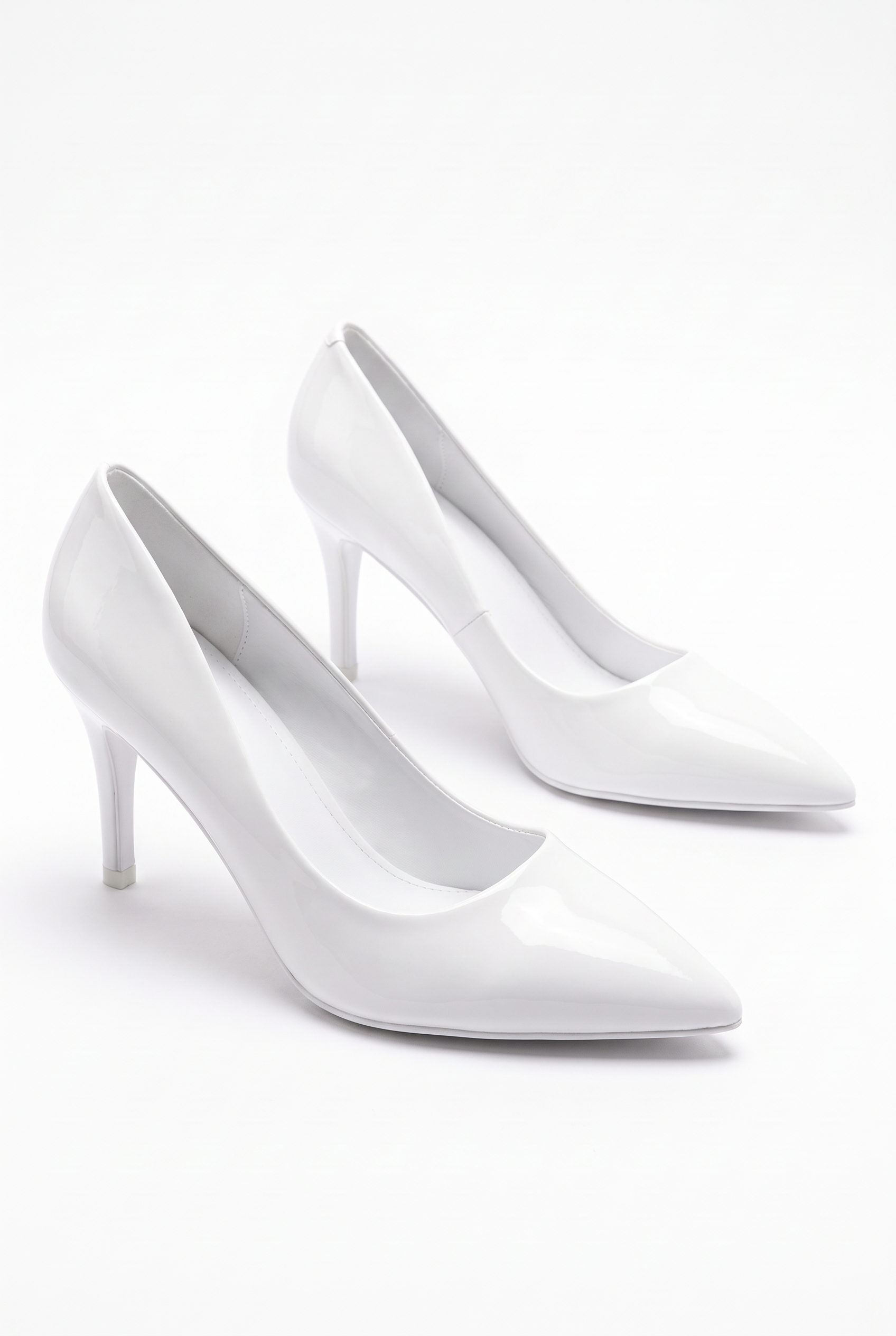 White flats with a thin heel