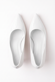 White flats with a thin heel