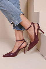 Burgundy stilettos with a thin heel