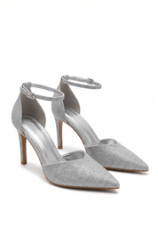 Gold heels on a thin heel